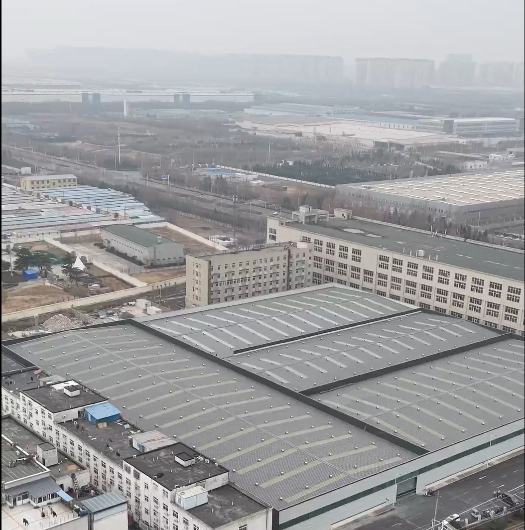 Aerial view of the production buildings and surrounding factory grounds